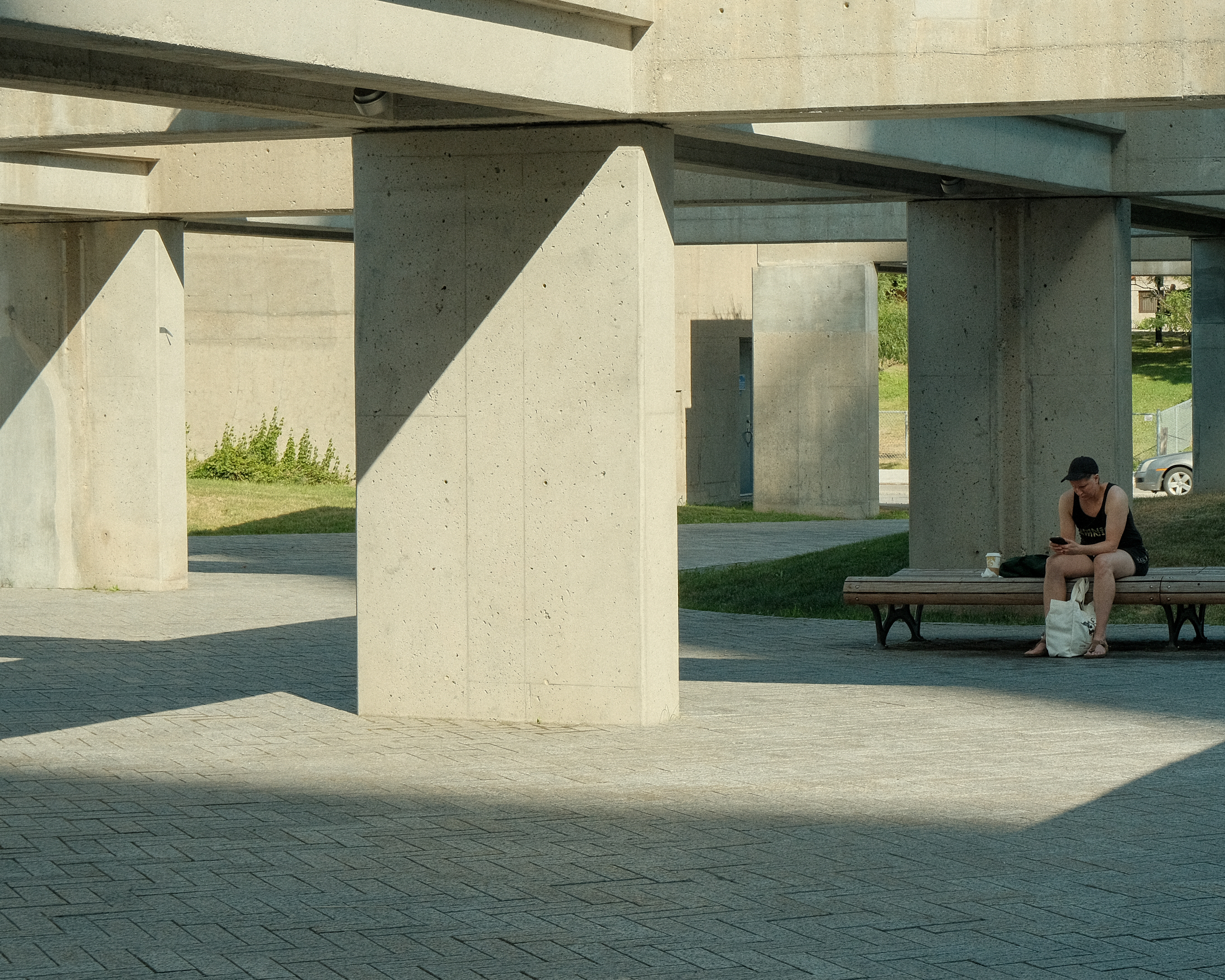 Person on Bench with Phone